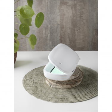 Logotrade corporate gift image of: Capsule UV smartphone sanitizer with 5W wireless charging pad