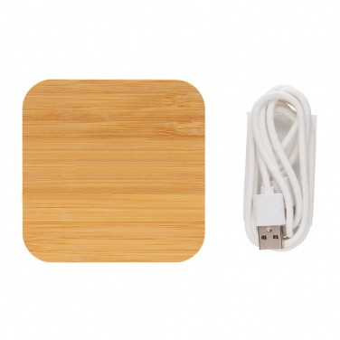 Logotrade meened pilt: Bambusest 5W juhtmevaba laadija USB-ga