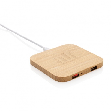 Logotrade reklaamkingituse foto: Bambusest 10 W juhtmevaba laadija USB-ga